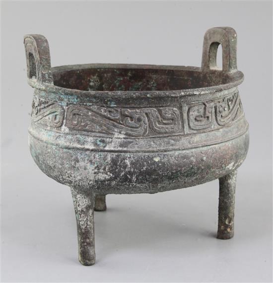 A large Chinese archaic bronze ritual food vessel, Ding, Western Zhou dynasty, 10th century B.C., 19cm high, 20cm wide